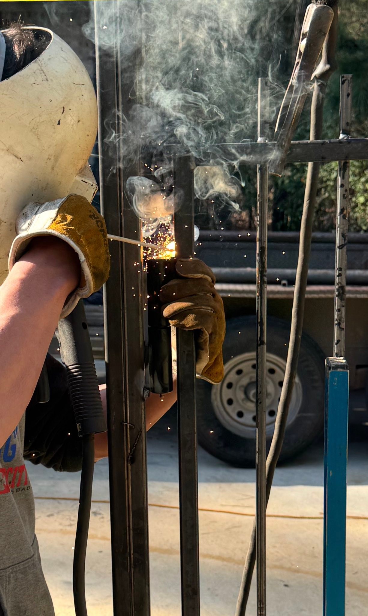Custom entry gate being hand-welded and fabricated